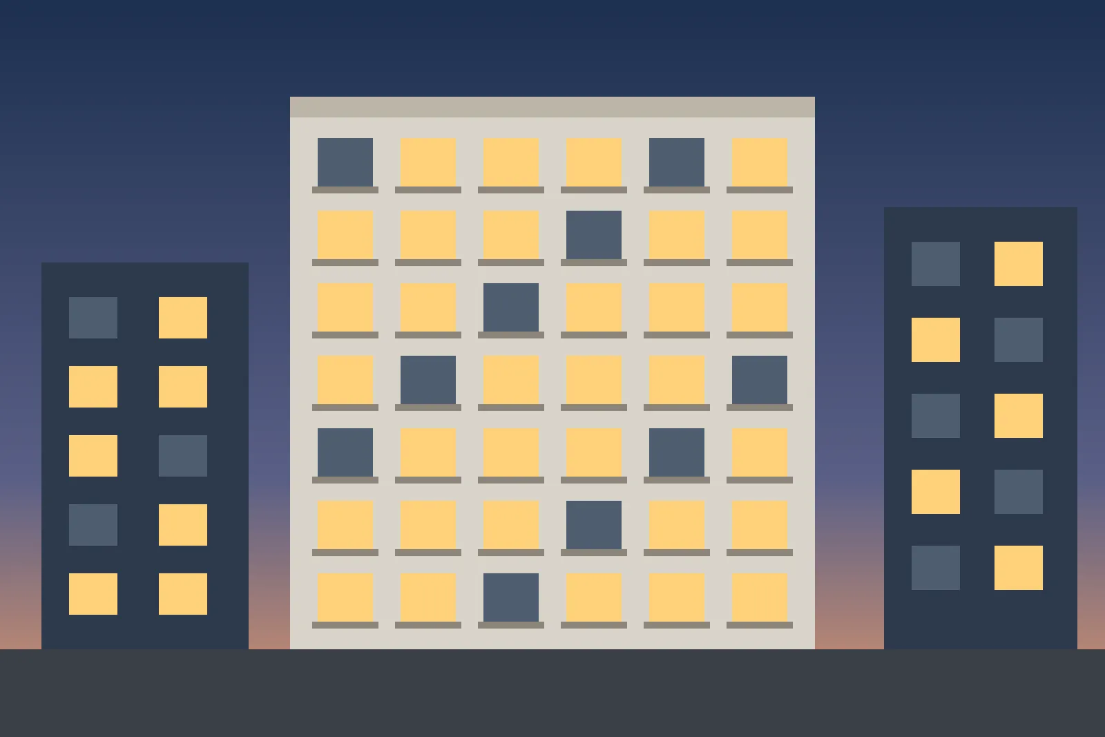 Block of city flats with warmly lit windows in the evening