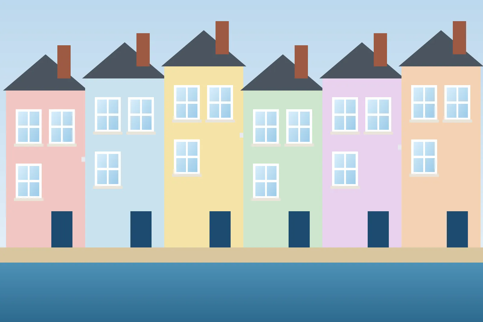 Colourful terraced houses along the seafront of a British coastal town