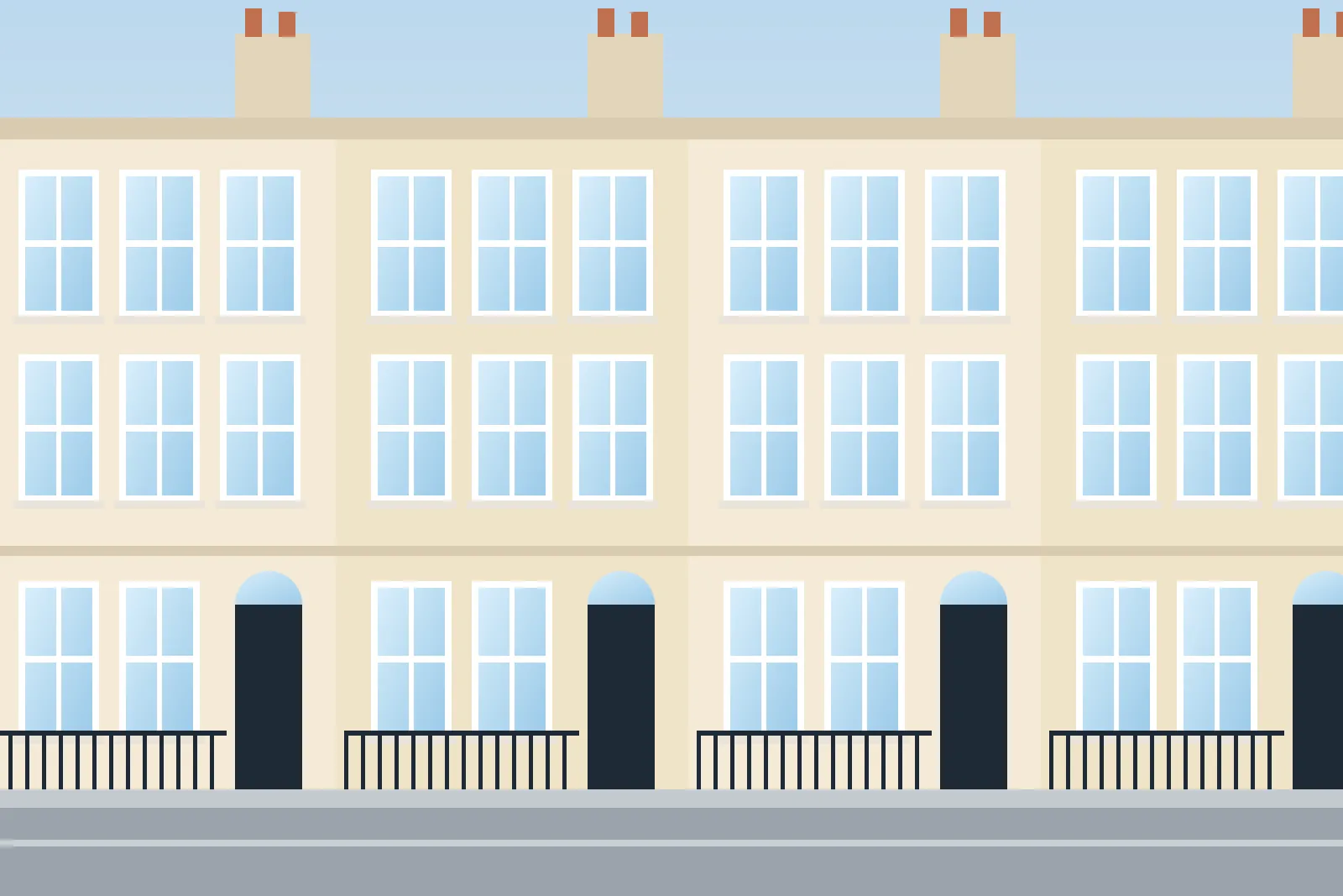 Georgian townhouses with sash windows, chimney stacks and black railings